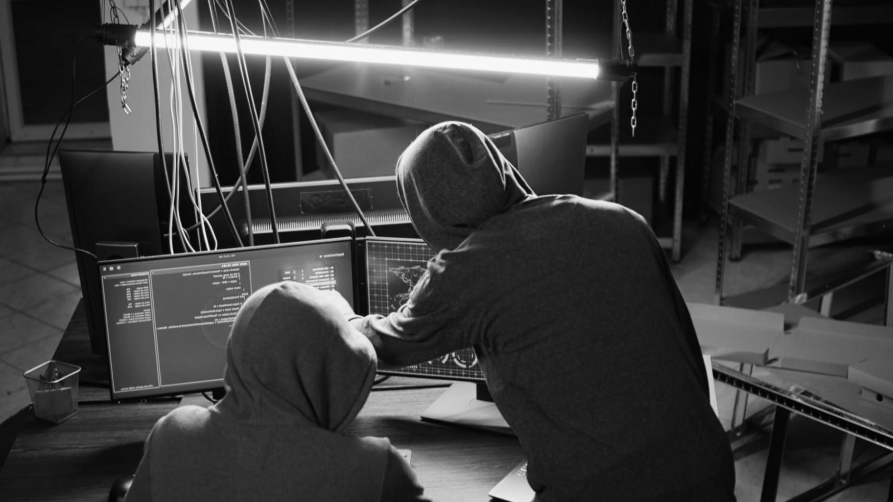 Students working on game development projects at computer workstations
